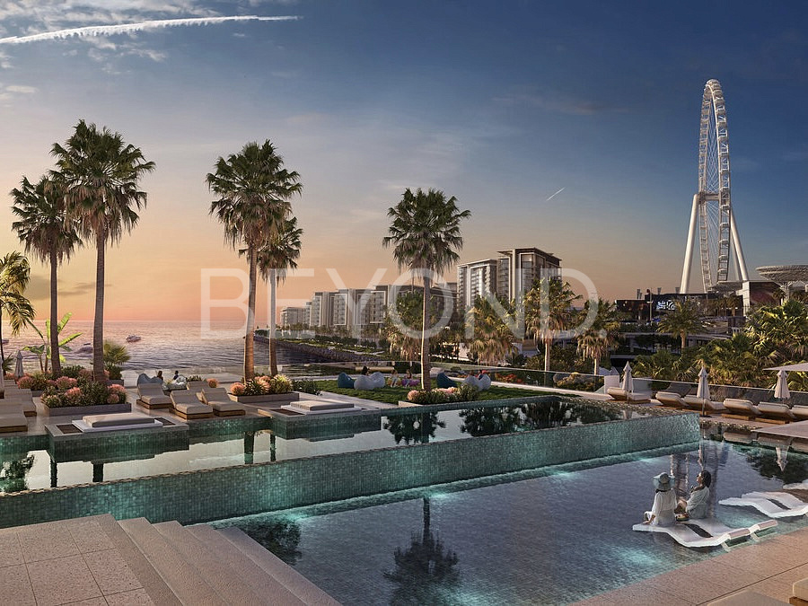 01_Zona_otdykha_u_bassei_na_s_potryasayushchim_vidom_na_vodu__naberezhnuyu_i_Ain_Dubai